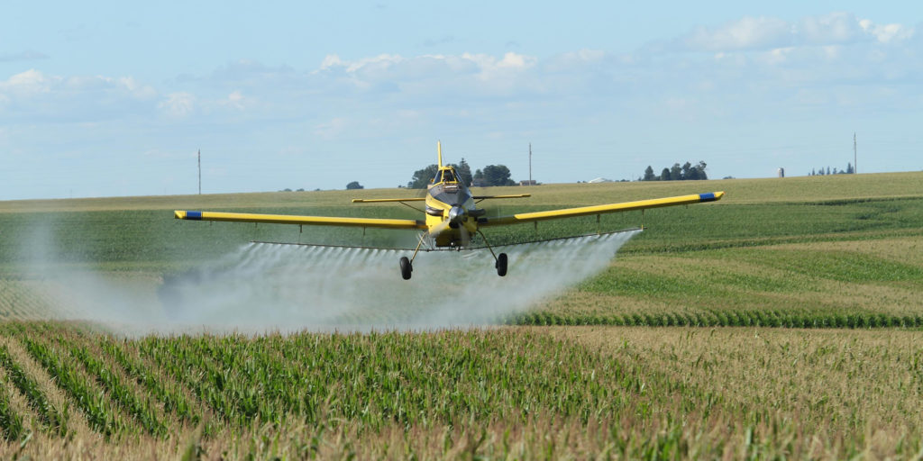 Aerial spraying of a field