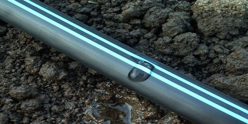 Close-up of slit drip irrigation tape