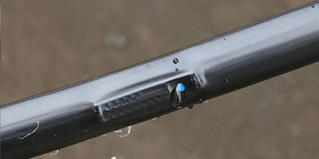 Close-up of emitter drip irrigation tape