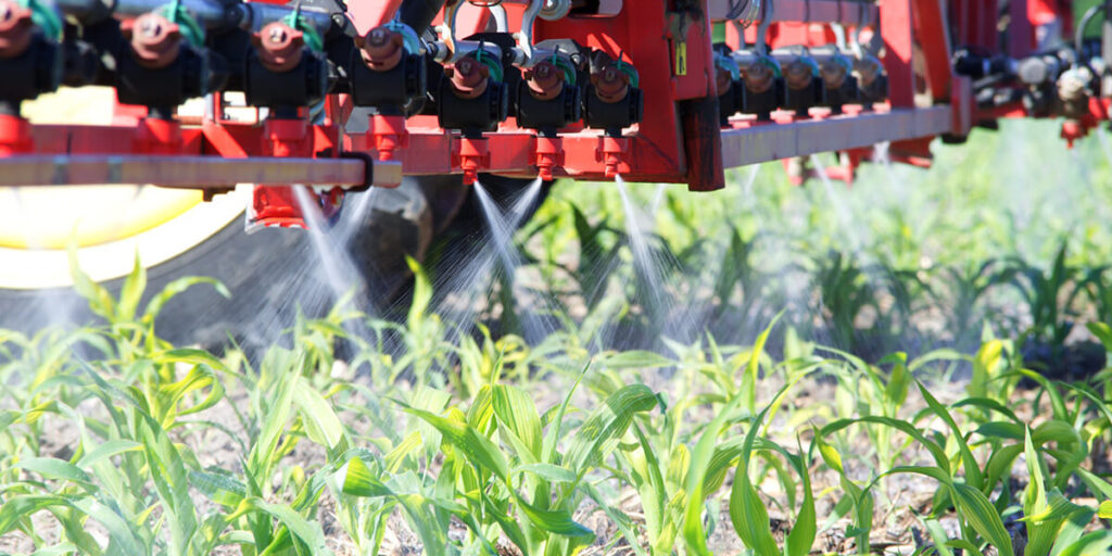 Herbicide spraying in the field