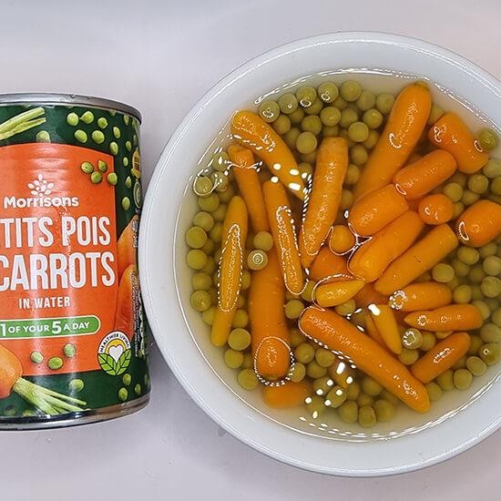 canned food with carrots and peas