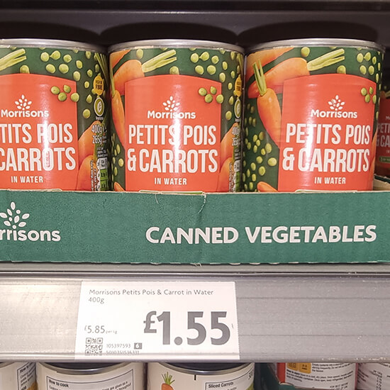 canned food with carrots and peas