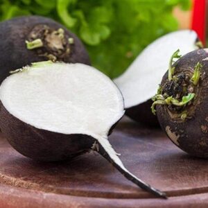 black radish, black radish cut, sliced black radish, fresh black radish, root vegetable, black radish cross-section, healthy vegetable, radish slice, natural food