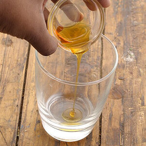 Homemade honey-based plant growth enhancer